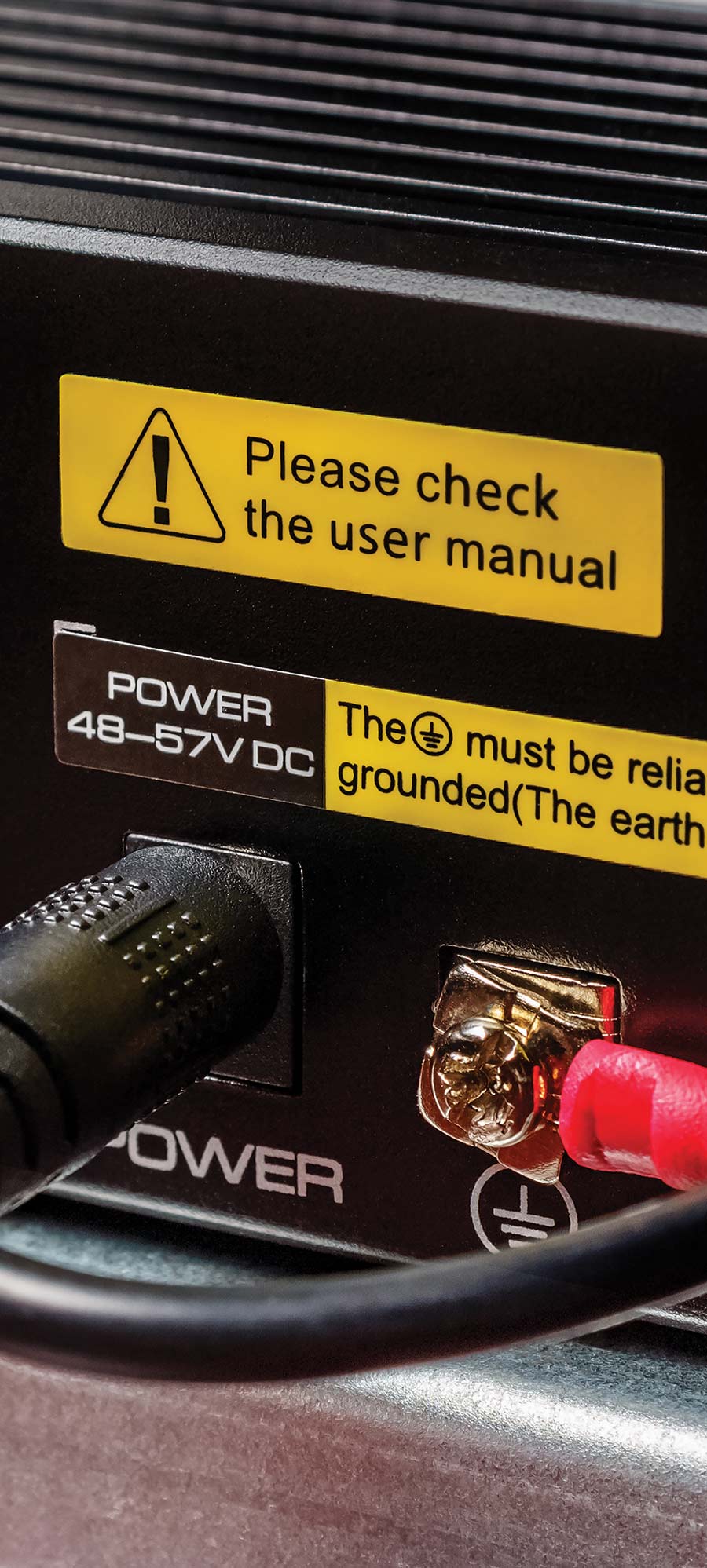 Electrical component with safety warnings on it