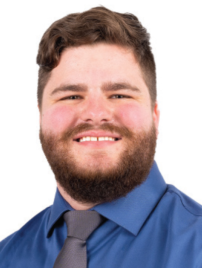 Nick Koeller smiling in a professional headshot