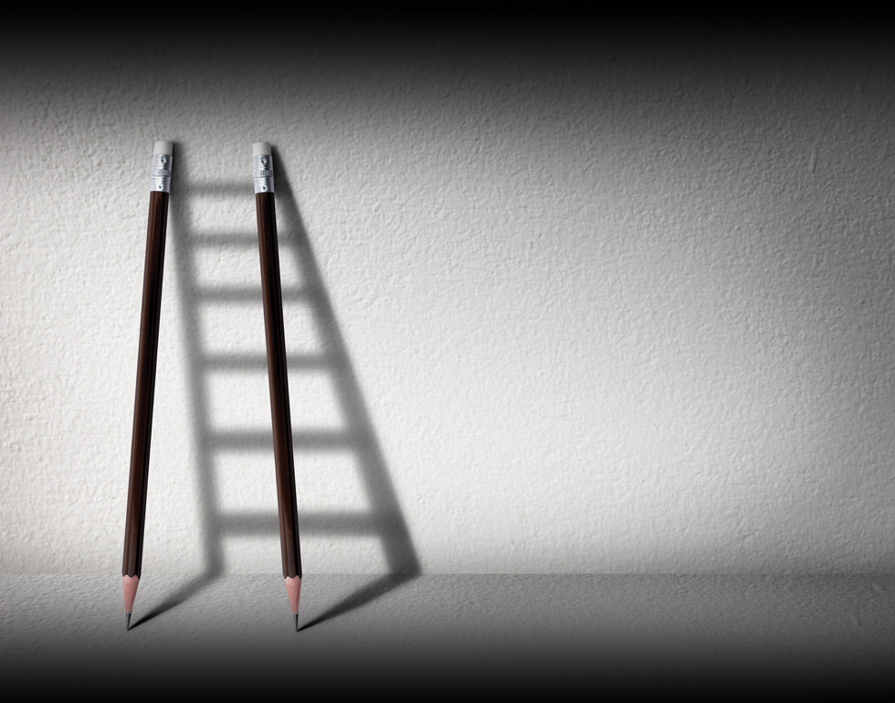 two pencils and their shadow that shows a ladder