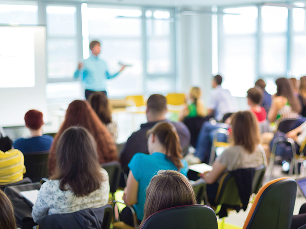 teacher and students in a class room