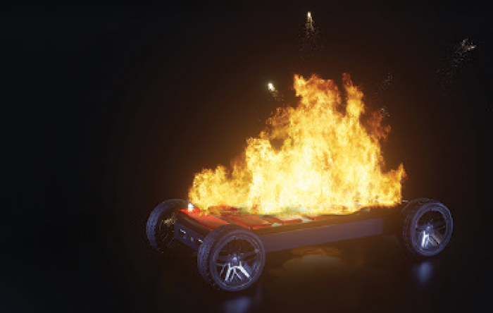 small flat vessel with four wheels on fire due to thermal runaway