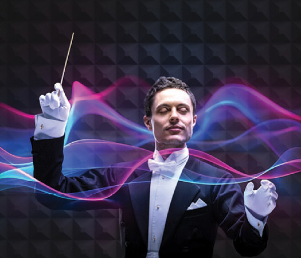 symphony conductor surrounded by pink and blue waves