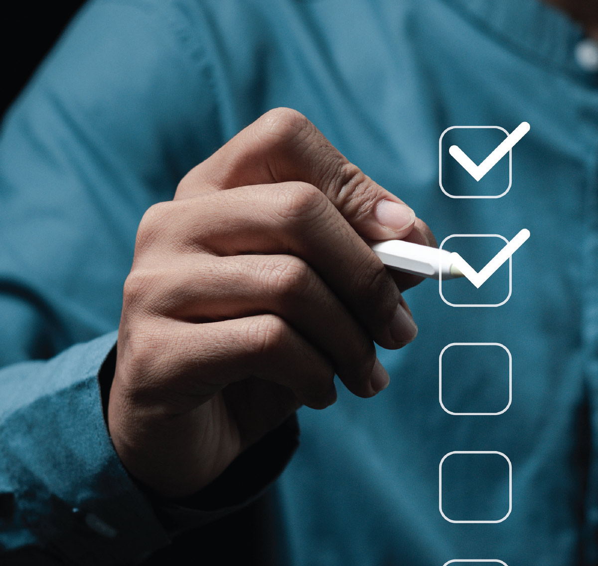 man holding stylus up to three boxes and one of them is checked