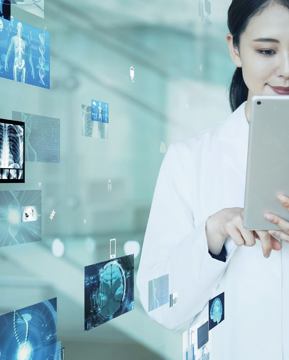 medical professional in lab coat on tablet with floating projected x-rays