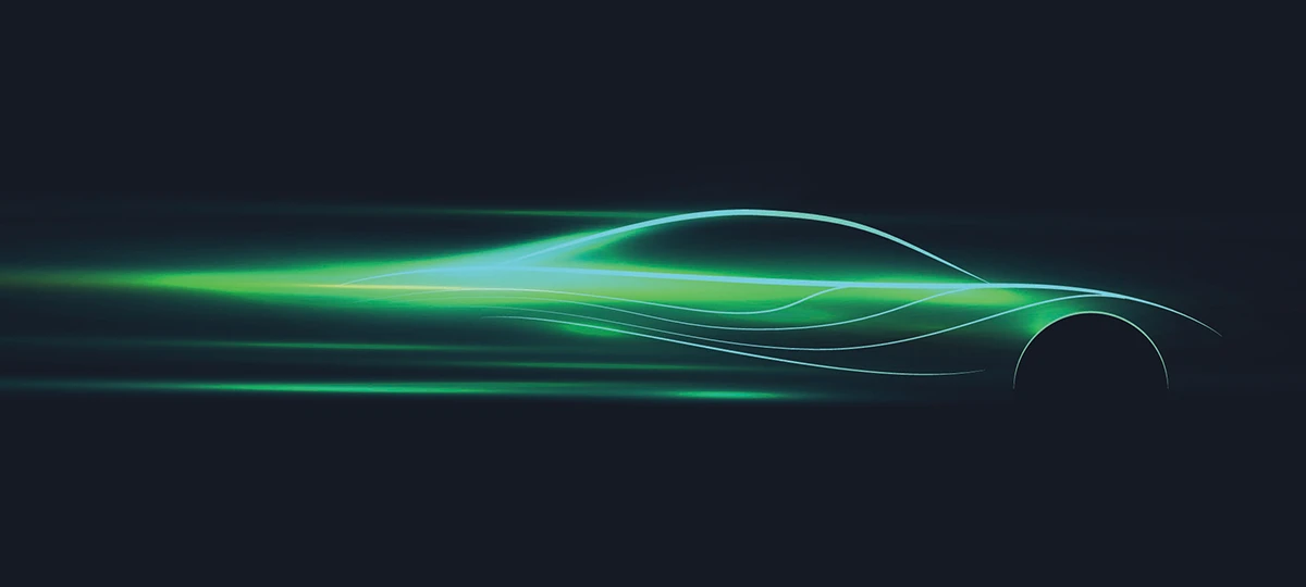 A futuristic, stylized outline of a fast-moving sports car is shown as a dynamic trail of glowing green and blue light against a dark background. The light streams backward, suggesting high speed, technology, and motion blur.