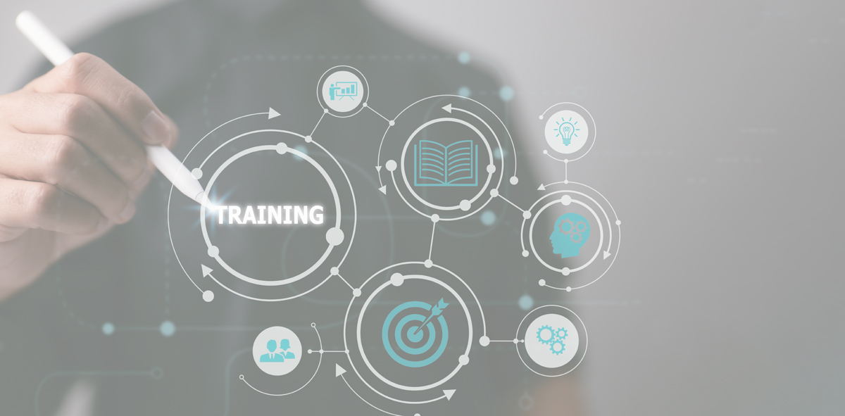 Person using a stylus to interact with digital icons related to training.