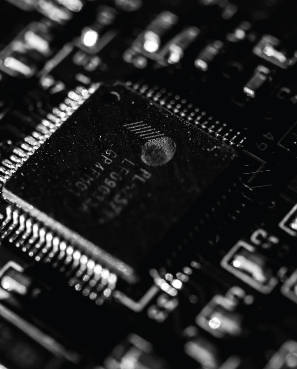 close up of a black and white circuitry board