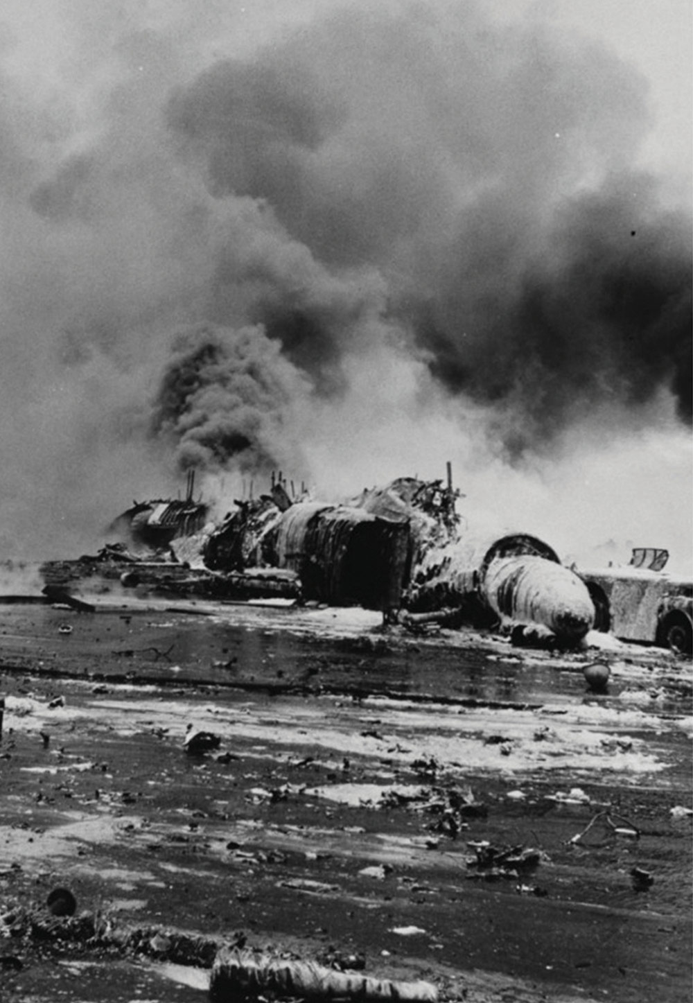 black and white photo of plane crash