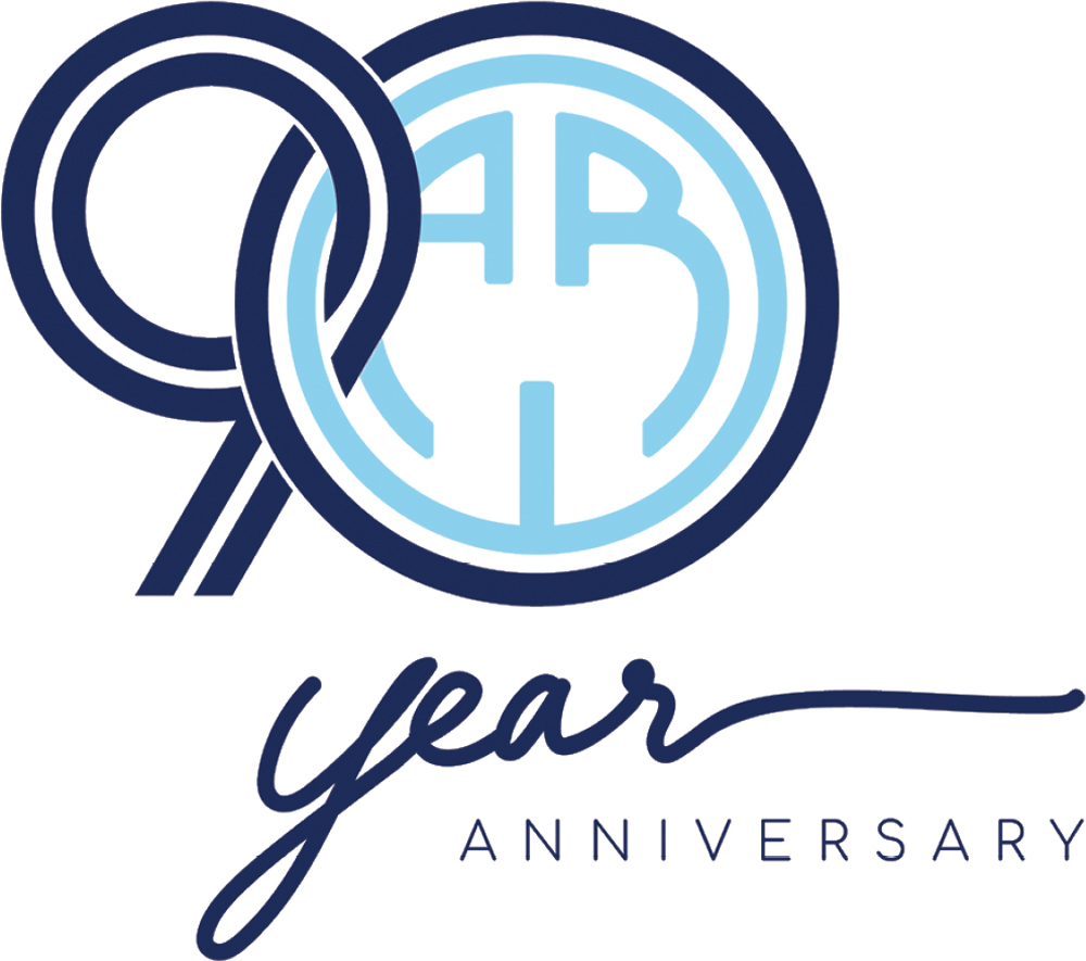 Blue graphic logo reading 90 Year Anniversary with stylized overlapping circles.